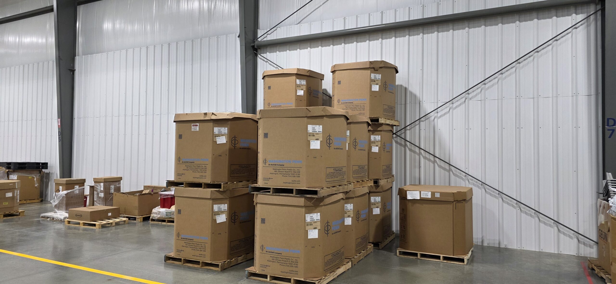 Raw plastic material storage and work in process storage